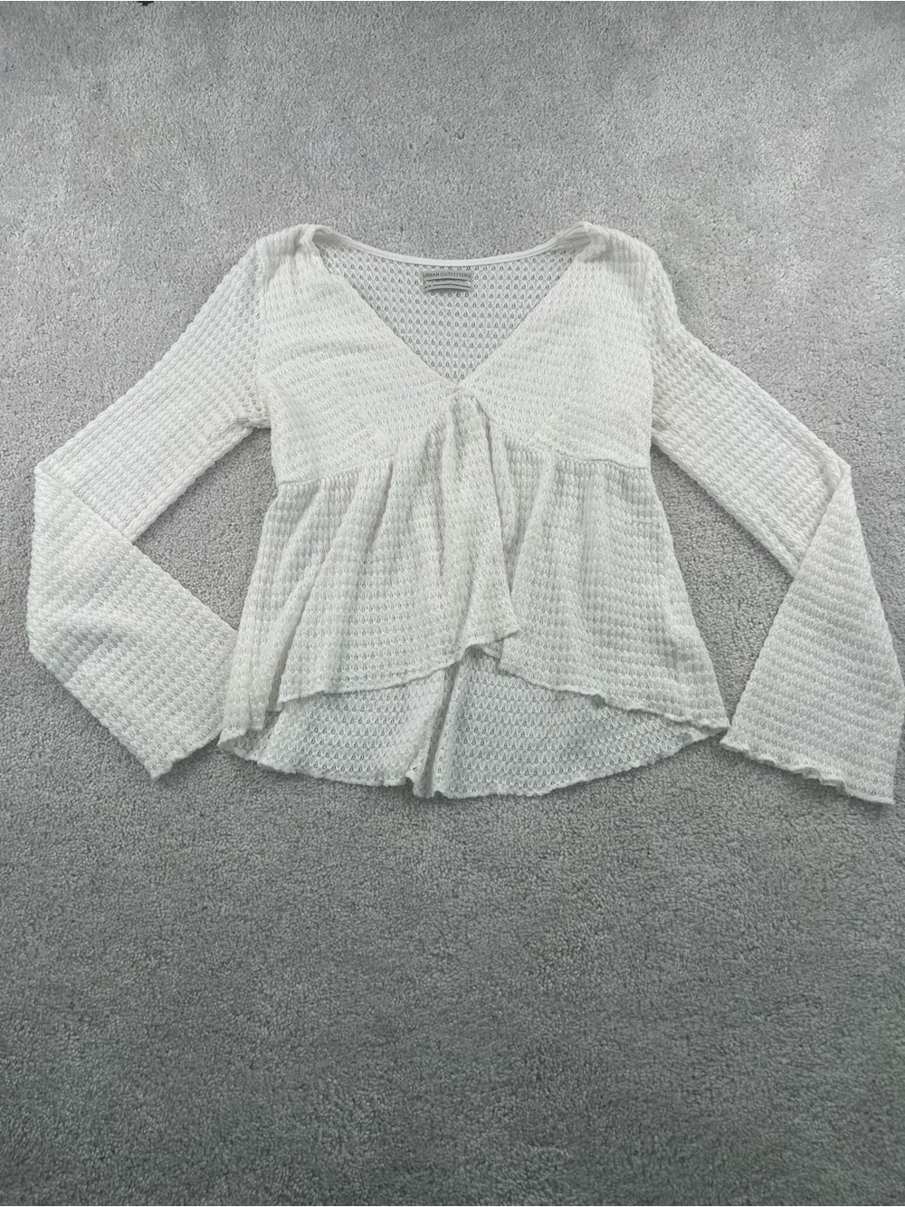Urban Outfitters White Textured V‑Neck Peplum Blouse
